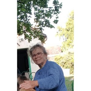 Evelyne M.